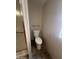 Bathroom toilet with nearby window and partial view of shower stall at 18026 N Cave Creek Rd # 140, Phoenix, AZ 85032