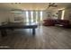 Relaxing billiards room with a stylish lighting and cozy seating area at 18026 N Cave Creek Rd # 140, Phoenix, AZ 85032