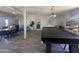Spacious clubhouse featuring a game table, ample seating, and modern decor at 18026 N Cave Creek Rd # 140, Phoenix, AZ 85032
