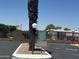 Community entrance with signage and well-maintained landscaping at 18026 N Cave Creek Rd # 140, Phoenix, AZ 85032