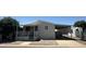 Inviting home featuring covered parking and a charming front porch area at 18026 N Cave Creek Rd # 140, Phoenix, AZ 85032