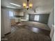 Open floor plan showing kitchen and living room combination with natural light at 18026 N Cave Creek Rd # 140, Phoenix, AZ 85032
