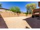 Large, enclosed backyard featuring gravel, providing a low-maintenance and versatile outdoor space at 2030 W Whisper Rock Trl, Phoenix, AZ 85085
