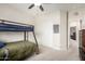 Bedroom features a bunk bed and storage with carpet flooring at 2030 W Whisper Rock Trl, Phoenix, AZ 85085