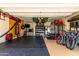 Garage featuring a climbing wall, punching bag, fitness equipment and storage at 2030 W Whisper Rock Trl, Phoenix, AZ 85085
