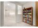 Upstairs hallway featuring built in bookcase at 2030 W Whisper Rock Trl, Phoenix, AZ 85085