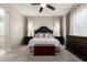 Comfortable main bedroom features a king-size bed, dark wood furniture, and soft lighting at 2030 W Whisper Rock Trl, Phoenix, AZ 85085