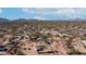 Aerial of a rural landscape showing homes interspersed in a desert setting at 2242 E 12Th Ave, Apache Junction, AZ 85119