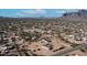 Aerial view of a home and community featuring mountain views in the distance at 2242 E 12Th Ave, Apache Junction, AZ 85119
