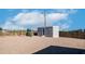 Spacious backyard with a playground and fencing provides a secure and enjoyable outdoor space at 2242 E 12Th Ave, Apache Junction, AZ 85119