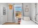Bright bedroom showcasing a bed and scenic mountain views from the window, merging indoor comfort with outdoor beauty at 2242 E 12Th Ave, Apache Junction, AZ 85119
