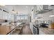 Bright kitchen with a large island, stainless steel appliances, and white cabinetry at 2242 E 12Th Ave, Apache Junction, AZ 85119
