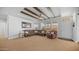 Spacious living room with beamed ceilings, comfortable seating and natural light at 2242 E 12Th Ave, Apache Junction, AZ 85119