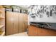 Workshop features tool storage, cabinets, and a workbench area for various projects and hobbies at 2242 E 12Th Ave, Apache Junction, AZ 85119
