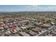 Well-planned community close to a golf course and featuring a mix of homes and green spaces at 22574 W Moonlight Path, Buckeye, AZ 85326
