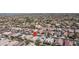 Established neighborhood with mature trees and a mix of home styles and solar panels at 22574 W Moonlight Path, Buckeye, AZ 85326