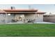 Charming covered patio with outdoor dining and cozy seating, great for entertaining at 236 E Minton Dr, Tempe, AZ 85282