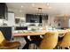 Bright open-concept dining room offers views to the modern kitchen and a comfortable living space at 236 E Minton Dr, Tempe, AZ 85282