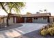 Charming home with a well-manicured front yard and long driveway at 236 E Minton Dr, Tempe, AZ 85282