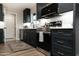 Bright kitchen features modern appliances, ample storage, white countertops and decorative backsplash at 236 E Minton Dr, Tempe, AZ 85282