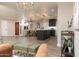 Bright, open-concept living space with dark kitchen cabinetry and dining area at 236 E Minton Dr, Tempe, AZ 85282