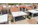 Aerial view showcases covered parking, well-maintained tile roofs and desert landscaping at 26 E Coral Gables Dr, Phoenix, AZ 85022