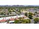 Wide aerial shot of community featuring desert landscaping, nearby park and mountain backdrop at 26 E Coral Gables Dr, Phoenix, AZ 85022
