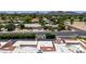 Charming single-level home featuring a well-manicured front yard and a convenient two-car garage, set against a backdrop of scenic mountains at 26 E Coral Gables Dr, Phoenix, AZ 85022