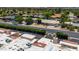 Scenic view of the property and its well-maintained surroundings, enhanced by the backdrop of lush trees and neighborhood at 26 E Coral Gables Dr, Phoenix, AZ 85022