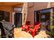 Cozy outdoor tiled patio with comfortable seating, perfect for enjoying the desert lifestyle at 26 E Coral Gables Dr, Phoenix, AZ 85022