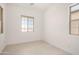 Bright bedroom features white walls, tile flooring and large windows offering plenty of natural light at 3629 E Rochelle Cir, Mesa, AZ 85213