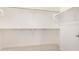 White, walk-in closet with installed shelving and natural light at 3629 E Rochelle Cir, Mesa, AZ 85213