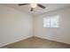 Bedroom with hardwood floors, a ceiling fan, and window with blinds at 3811 S Mill Ave, Tempe, AZ 85282