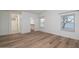 Spacious bedroom featuring hardwood floors, natural light and walk-in closet at 3956 N 151St Dr, Goodyear, AZ 85395