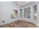 Bright breakfast nook featuring hardwood floors and natural light from the window at 3956 N 151St Dr, Goodyear, AZ 85395