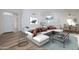 Bright staged open-concept space with stylish furnishings and modern décor at 3956 N 151St Dr, Goodyear, AZ 85395
