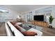 Bright staged open-concept space with stylish furnishings and modern décor at 3956 N 151St Dr, Goodyear, AZ 85395
