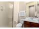 Modern bathroom featuring a glass-enclosed shower, sleek vanity, and neutral color palette at 4167 E Sierra Madre Ave, Gilbert, AZ 85296