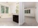 Bathroom featuring a soaking tub, vanity, and plantation shutters at 4167 E Sierra Madre Ave, Gilbert, AZ 85296