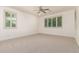 Bright bedroom with neutral carpet, and plantation shutters at 4167 E Sierra Madre Ave, Gilbert, AZ 85296