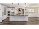 Kitchen island with granite countertops and stainless steel appliances at 4167 E Sierra Madre Ave, Gilbert, AZ 85296