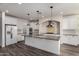 Bright kitchen with white cabinets, granite counters, subway tile backsplash and stainless appliances at 4167 E Sierra Madre Ave, Gilbert, AZ 85296