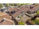 Aerial view showcasing the home's backyard, patio and mature landscaping at 4182 W Park Ave, Chandler, AZ 85226