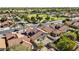 Aerial view of a home with desert landscaping and community green space at 4182 W Park Ave, Chandler, AZ 85226