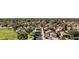 A wide aerial view of many homes with mature trees along neighborhood streets at 4182 W Park Ave, Chandler, AZ 85226