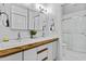 Bright bathroom features a double sink vanity, modern fixtures, and separate shower at 4182 W Park Ave, Chandler, AZ 85226