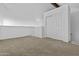 Carpeted empty bedroom with light walls and large closet with a door at 4182 W Park Ave, Chandler, AZ 85226