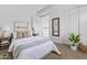 Light and airy bedroom with closet, bed, decor, and open door to the upstairs landing at 4182 W Park Ave, Chandler, AZ 85226
