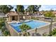 A community pool has a spa and a covered patio, with fencing to ensure safety in the residential community at 4182 W Park Ave, Chandler, AZ 85226