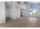 Spacious living room with high ceilings, large windows, and modern flooring, ideal for entertaining and relaxation at 4182 W Park Ave, Chandler, AZ 85226